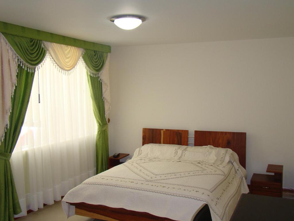 Apartahotel Vincent Suites Pasto Kamer foto